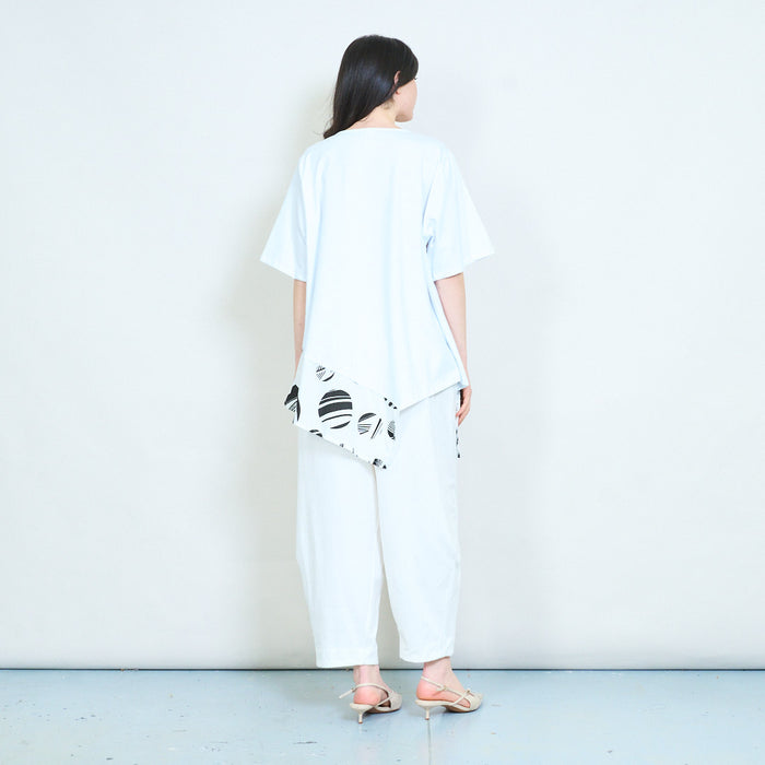 Abstract printed contrast panel asymmetrical hem loose fit round neck tunic top wholesale