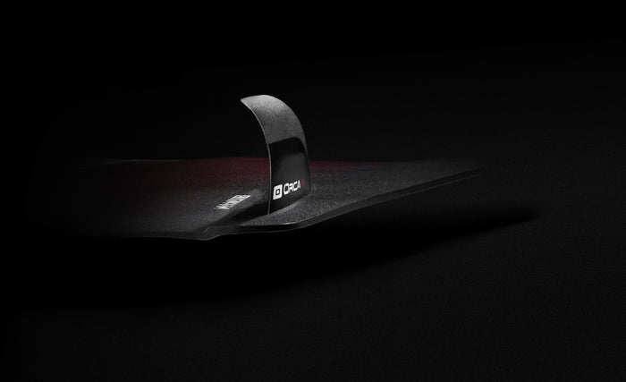 ORCA Pro x CORE fins mounted on twin-tip kiteboard heel-side