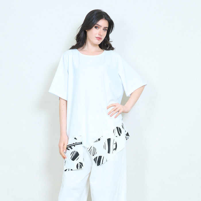 Abstract printed contrast panel asymmetrical hem loose fit round neck tunic top wholesale