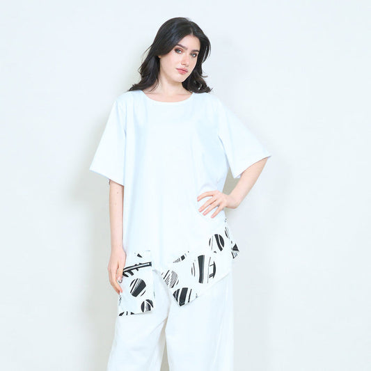 Abstract printed contrast panel asymmetrical hem loose fit round neck tunic top wholesale