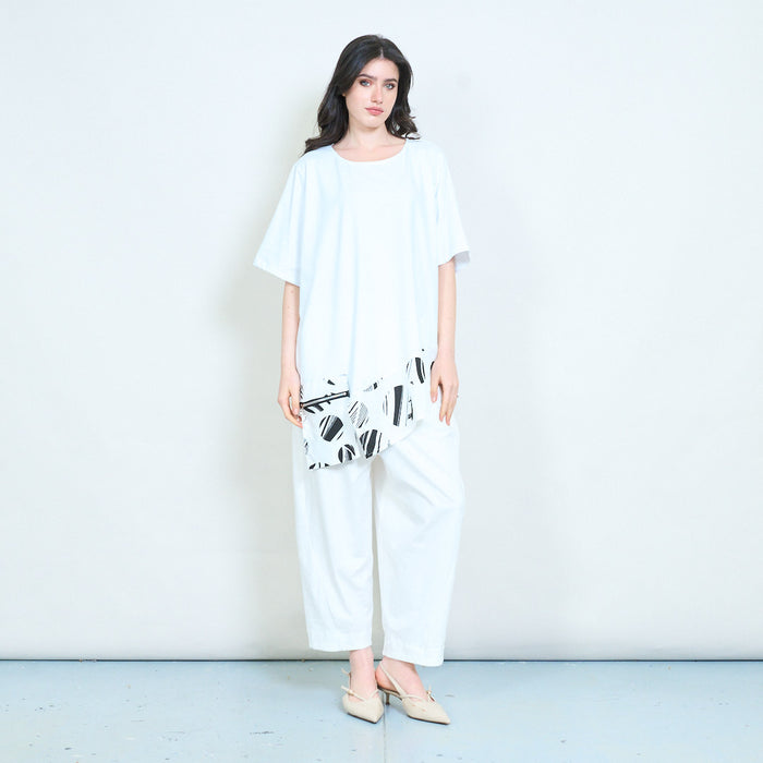 Abstract printed contrast panel asymmetrical hem loose fit round neck tunic top wholesale