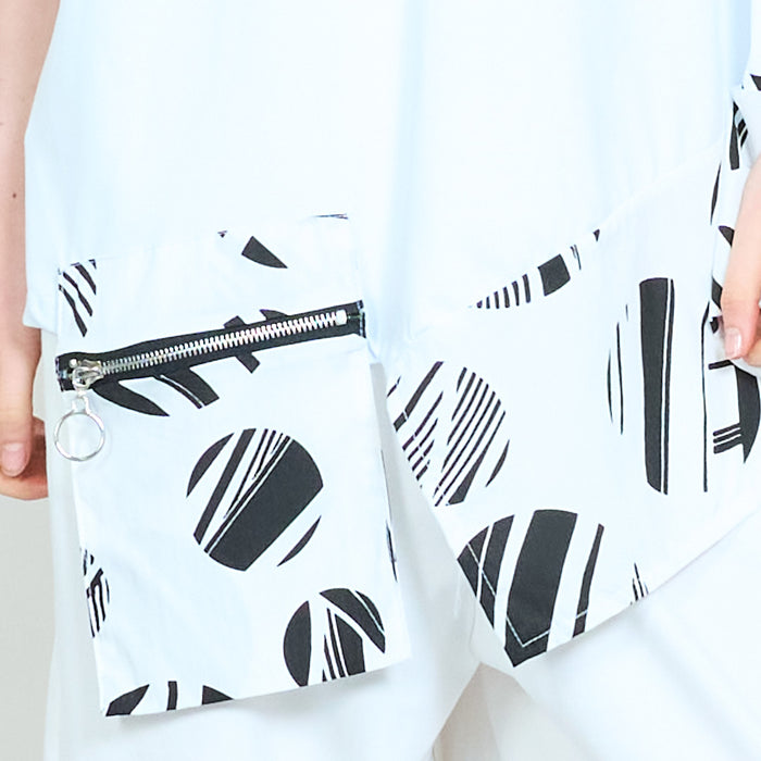 Abstract printed contrast panel asymmetrical hem loose fit round neck tunic top wholesale