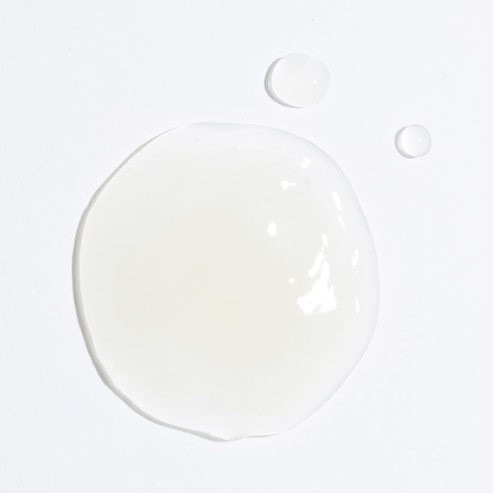Glob of serum on white background