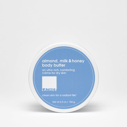 A container of Almond, Milk & Honey Body Butter by LATHER on white background.