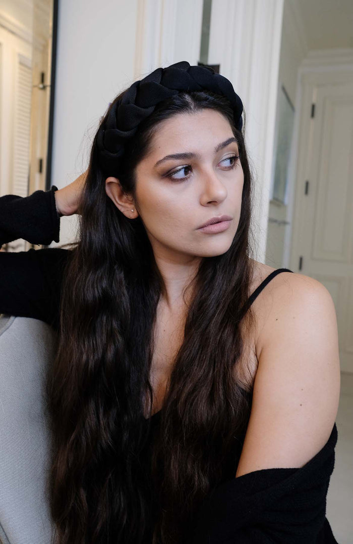 Photo of a pretty girl wearing an Anna Fashion Braided Black 1.5" Headband
