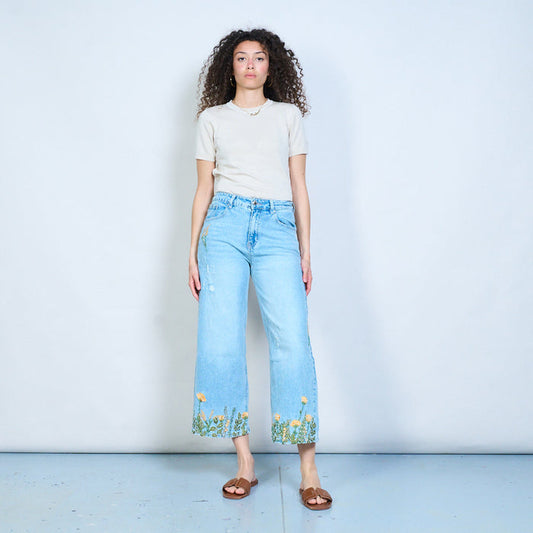 Beaded floral hem statement denim trousers with distressed details wholesale