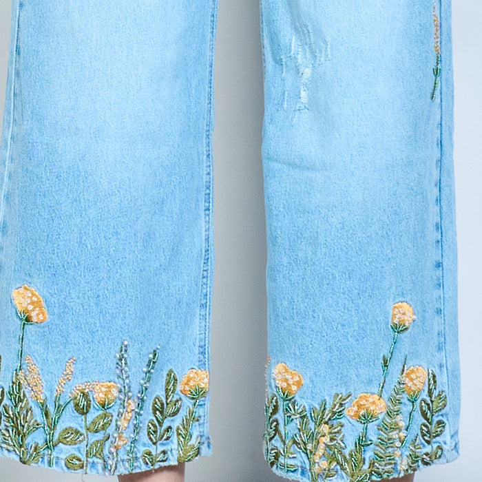 Beaded floral hem statement denim trousers with distressed details wholesale