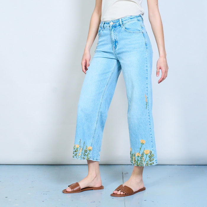 Beaded floral hem statement denim trousers with distressed details wholesale