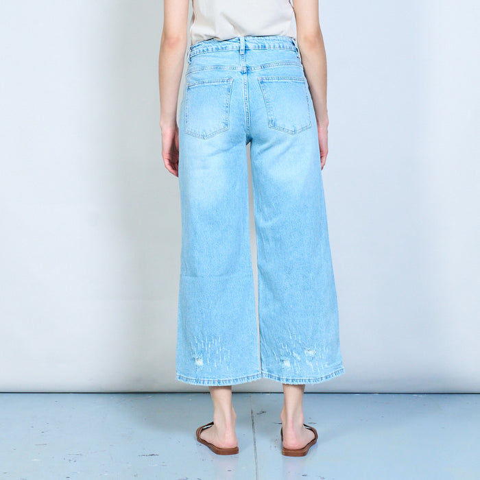 Beaded floral hem statement denim trousers with distressed details wholesale