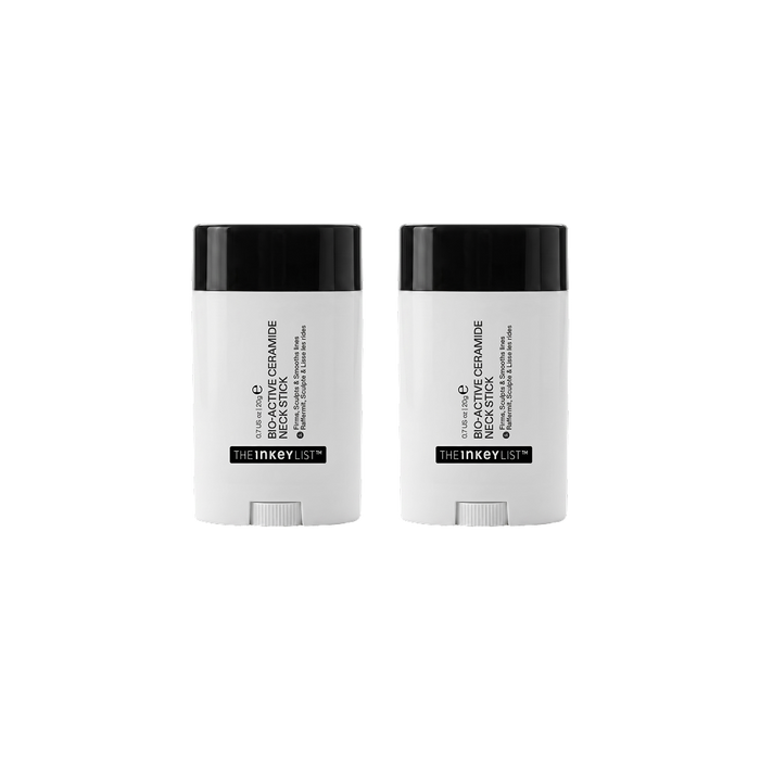 Two white and black stick containers of The Inked List neck stick, displayed side-by-side on a solid white background.