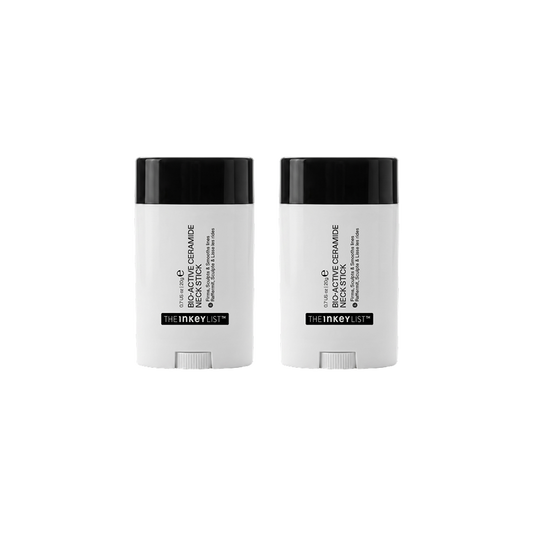 Two white and black stick containers of The Inked List neck stick, displayed side-by-side on a solid white background.