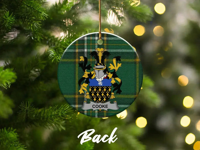 Cooke double-sided ceramic ornament with surname emblem on Irish tartan.