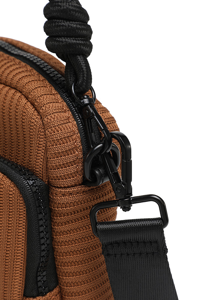 Curved sport crossbody bag with ribbed texture and mini pouch wholesale