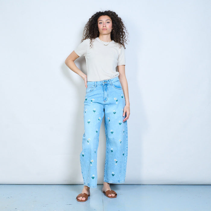 Daisy embroidered denim trousers wholesale