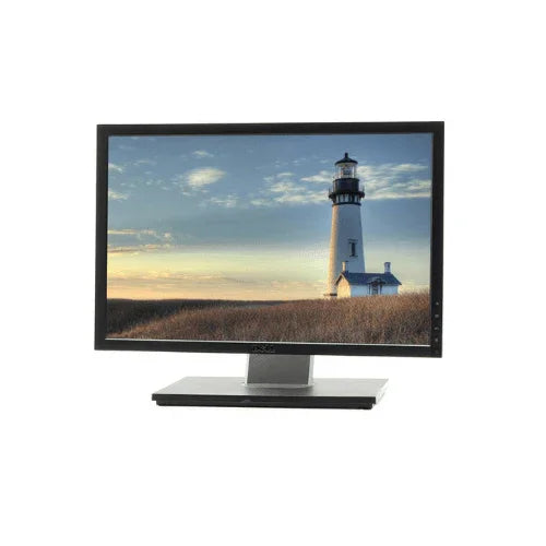 A Dell 1909WB 19" Monitor displays a scenic sunset image of a lighthouse and tall grass under scattered clouds, showcased in vivid detail on its 1440x900 16:10 screen.