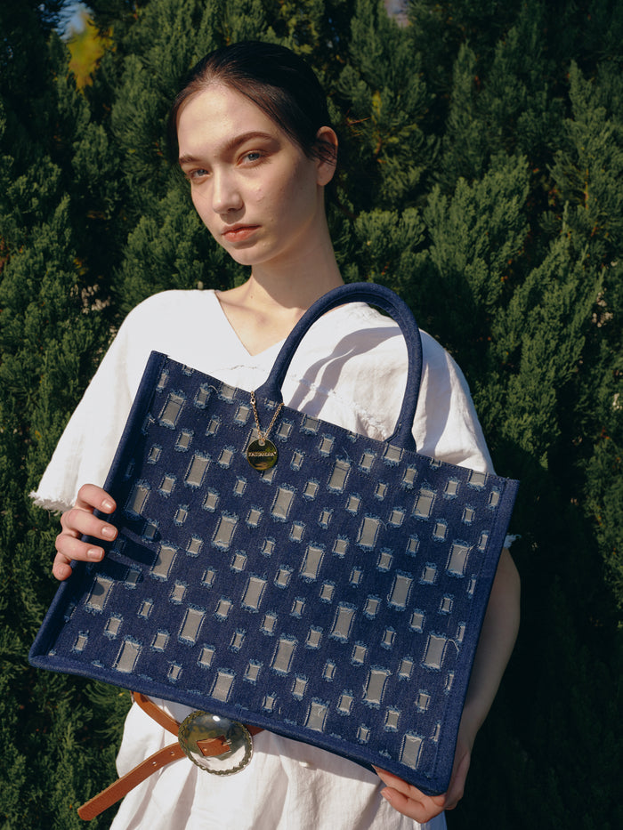 Distressed denim tote with mirror panel detail wholesale