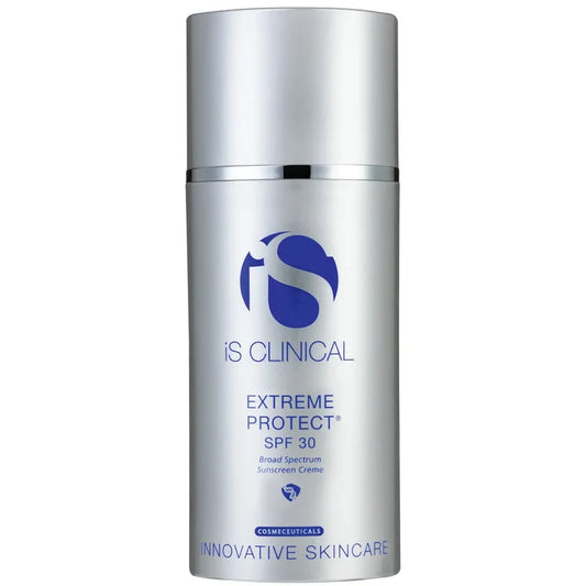 Silver pump bottle of iS Clinical Extreme Protect SPF 30 broad spectrum sunscreen crème on white background