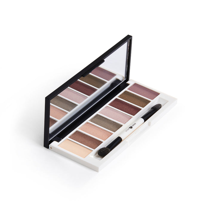 Explore the Lily Lolo Eye Palette offering eight versatile shades from light beige to dark brown and mauve. Made with natural ingredients, this palette comes with a mirror and a dual-ended applicator for easy application.