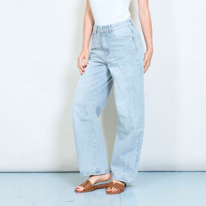 Grey wash denim jeans with curved panel seam detail wholesale
