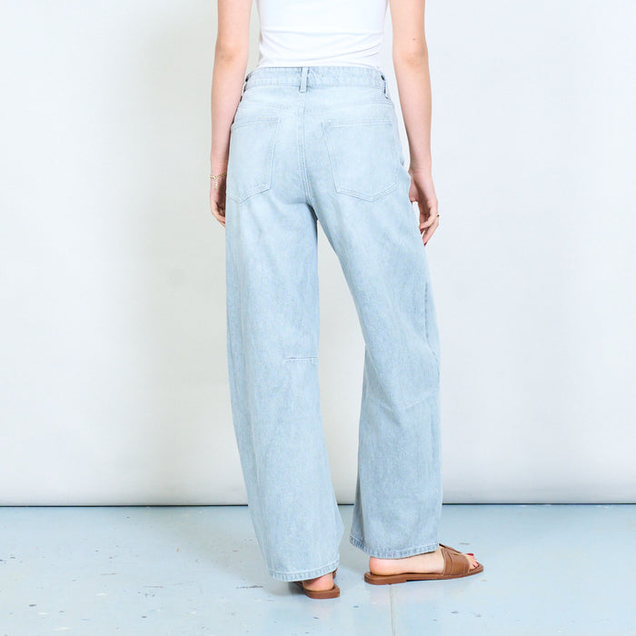 Grey wash denim jeans with curved panel seam detail wholesale
