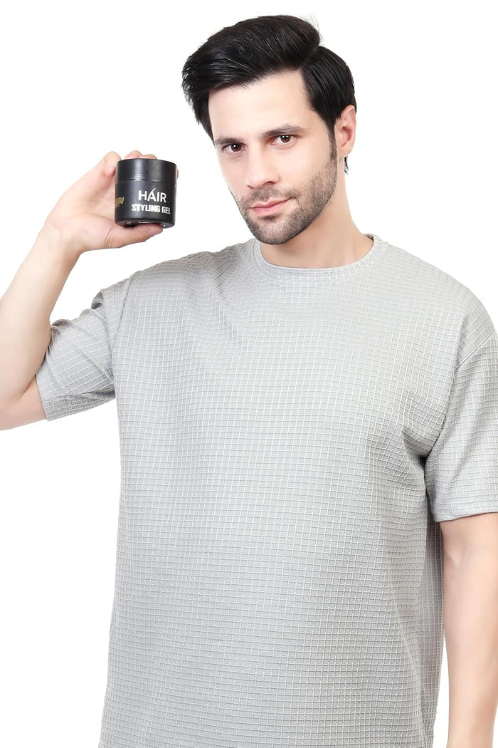 hair styling gel hold by a man