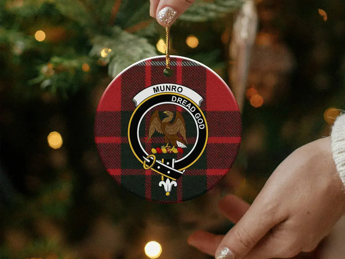 Munro Family Crest ornament held beside tree decorations