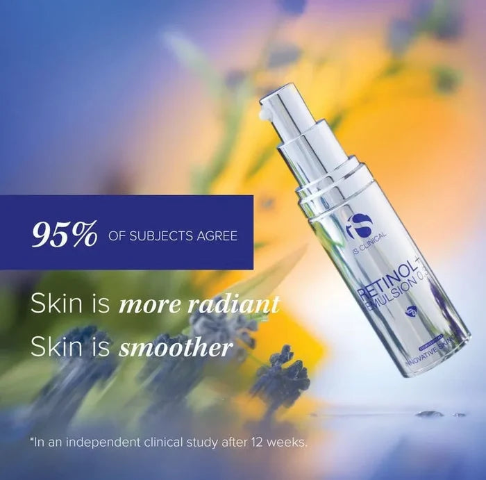iS Clinical Retinol+ Emulsion 0.3 silver pump bottle with blurred yellow and purple floral background