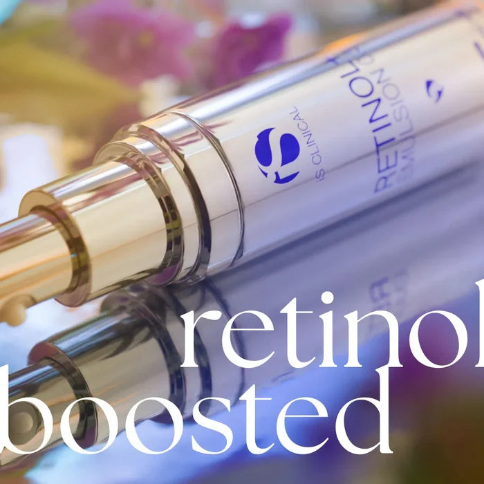 Close-up of iS Clinical Retinol+ Emulsion 0.3 pump bottle with reflective surface and blurred background