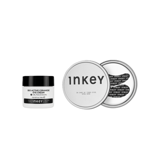 The Inkey Bio-Active Ceramide Eye Cream in a white jar with a black lid, shown next to a silver round tin displaying the product's packaging details on a solid white background.