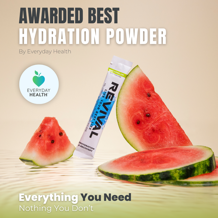 Revival Rehydration & Recovery Electrolyte Drink Watermelon sachet with fresh watermelon slices on a beige background.