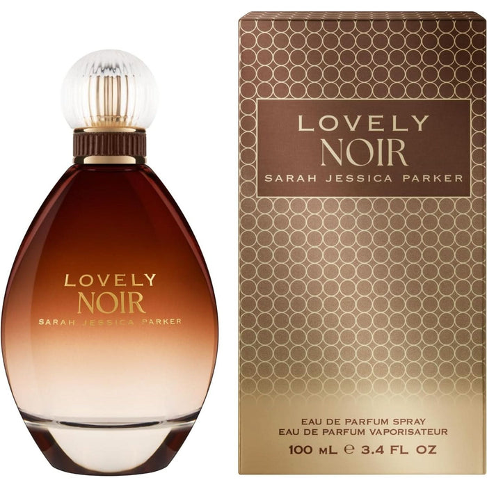 Sarah Jessica Parker Lovely Noir EDP 100ml dark amber bottle with ribbed cap beside gold circle-patterned box on white background