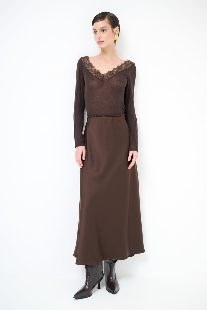 Silk-touch flow midi skirt with minimalist straight drape wholesale